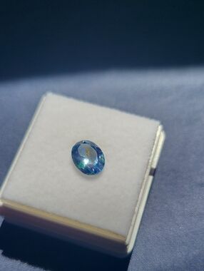 Idiosyncratic Color Faceted Topaz Gemstone